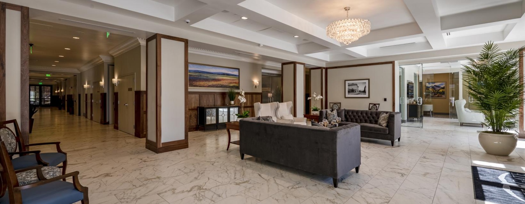 a large foyer with a white tile floor