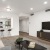 a living room with a tv and couches