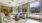a lounge room with a large window